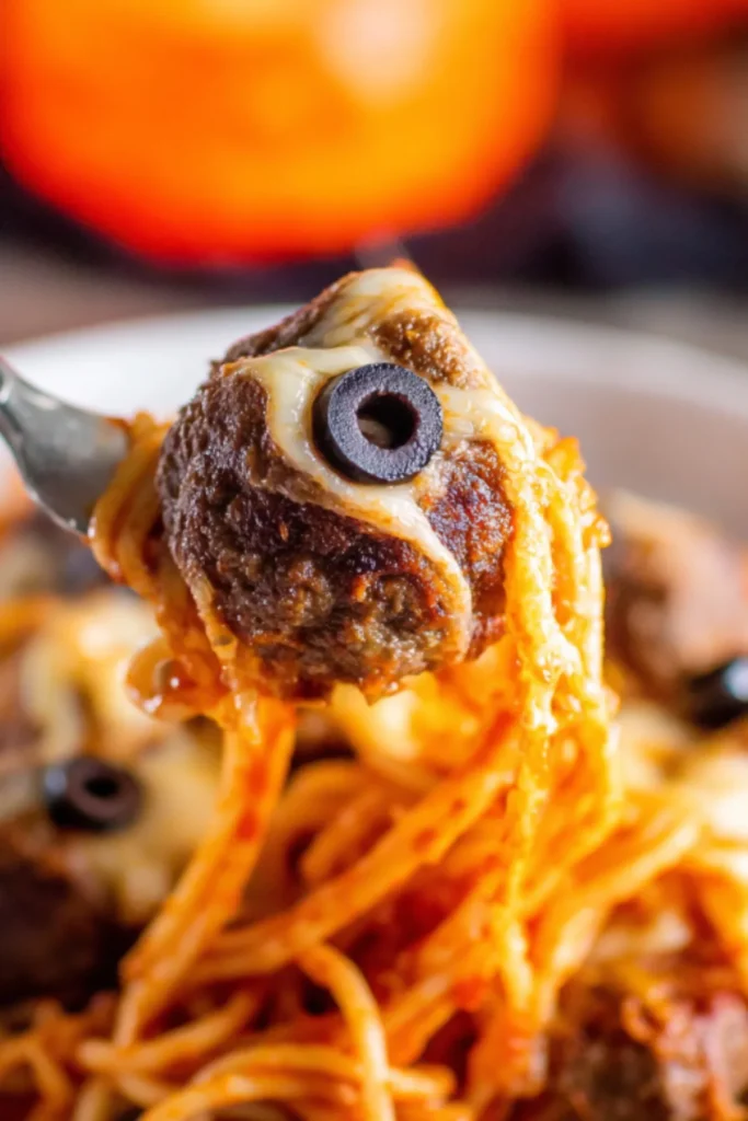 Spaghetti with Cheese Stuffed Meatballs and Olives