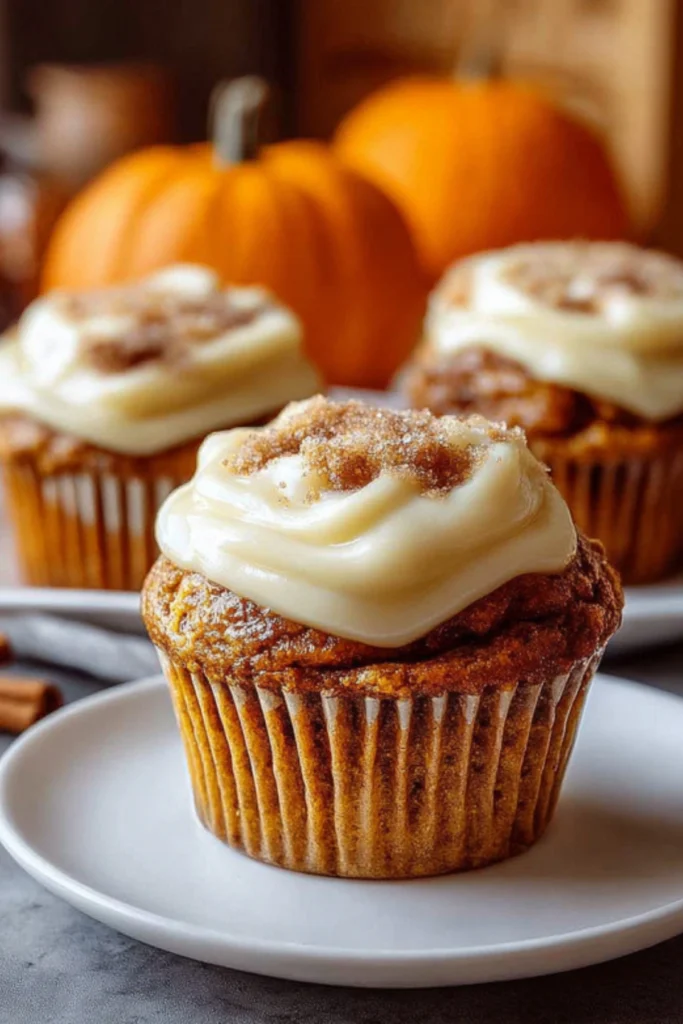 Pumpkin Cream Cheese Muffins with Creamy Frosting and Cinnamon Sugar Topping