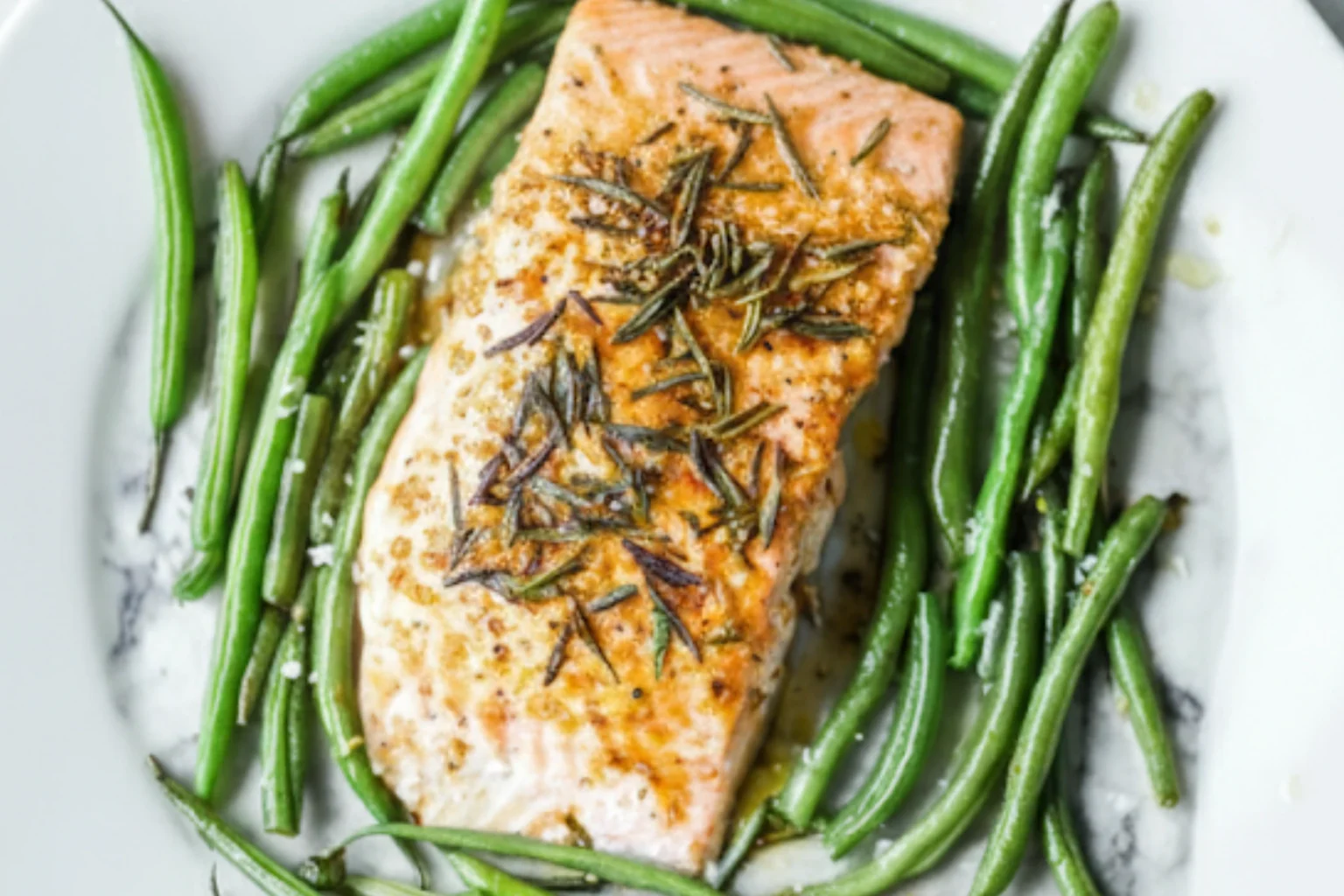 Maple Glazed Salmon with Green Beans and Rosemary Garnish