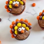 Thanksgiving Turkey Cupcakes with Colorful Candy Feathers
