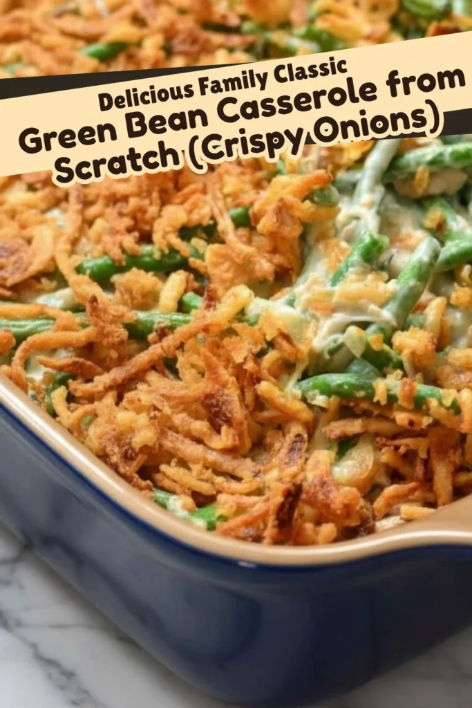 Green bean casserole from scratch topped with crispy onions in a blue baking dish