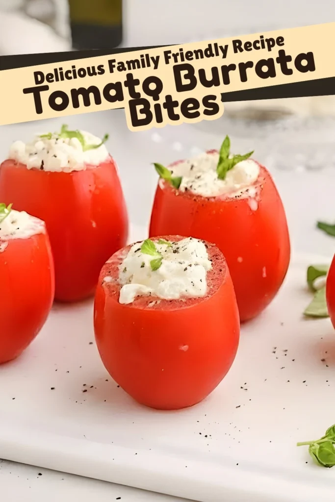 Tomato Burrata Bites filled with creamy burrata cheese and topped with basil, served on a white board as a delicious family-friendly appetizer.