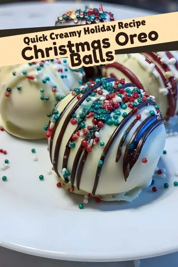 Christmas Oreo Balls covered in white chocolate and drizzled with dark chocolate, topped with festive red and green sprinkles on a white plate