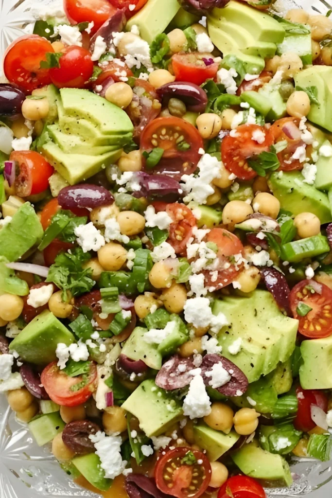 Chickpea Avocado Salad with Tomatoes, Olives, Cucumbers, and Feta