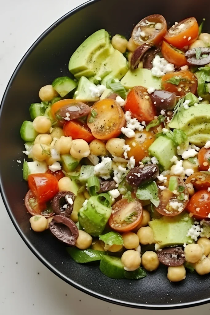 Chickpea Avocado Salad with Cherry Tomatoes, Cucumbers, and Feta