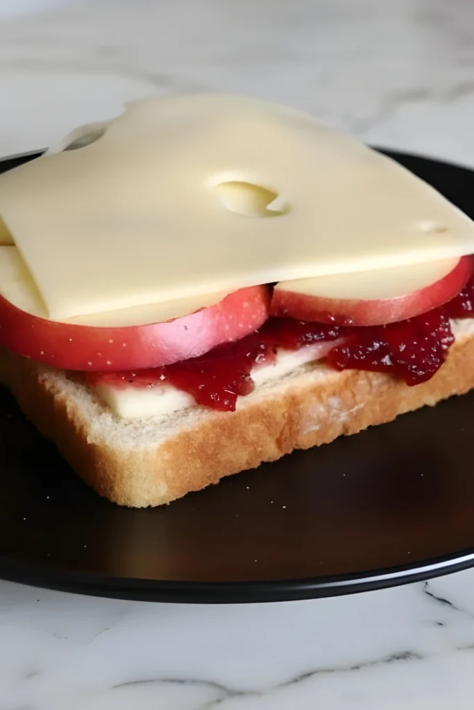 Apple Cranberry Grilled Cheese Sandwich Prep with Swiss Cheese and Fresh Apples