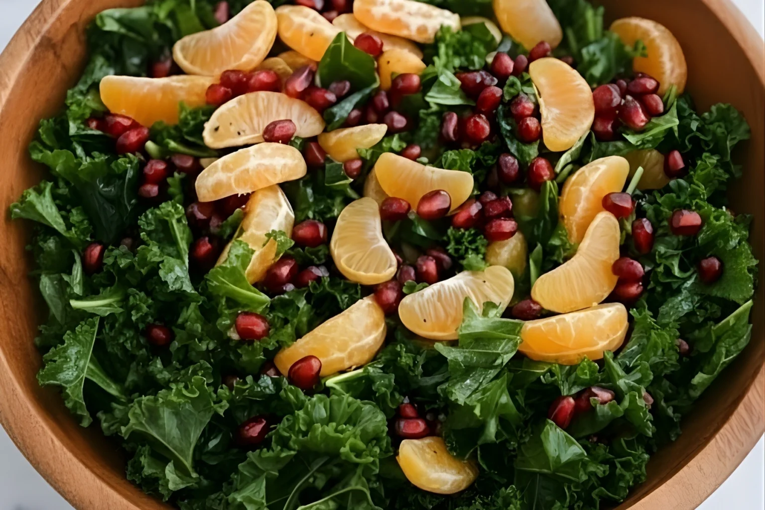Citrus Pomegranate Kale Salad with Mandarins and Pomegranate Seeds