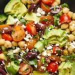 Chickpea Avocado Salad with Tomatoes, Cucumbers, Olives, and Feta