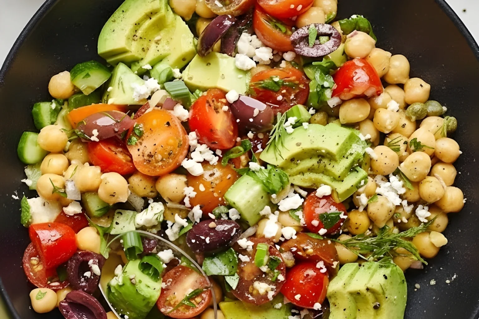 Chickpea Avocado Salad with Tomatoes, Cucumbers, Olives, and Feta