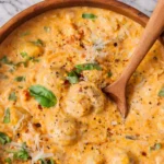 Creamy Tuscan Marry Me Mushrooms cooked in a rich garlic parmesan sauce with basil and red pepper flakes served in a rustic bowl