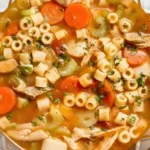 Sicilian Chicken Soup with ditalini pasta carrots celery and tender shredded chicken in a cozy Italian broth