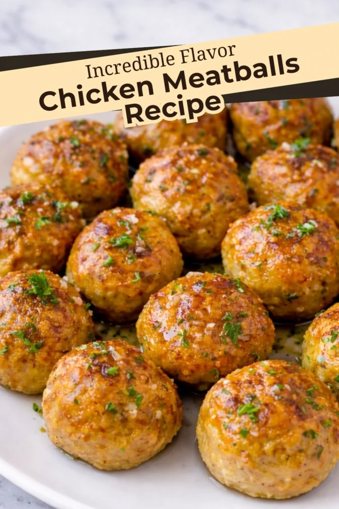 Baked chicken meatballs with garlic butter glaze and herbs served on a plate with text overlay reading Chicken Meatballs Recipe