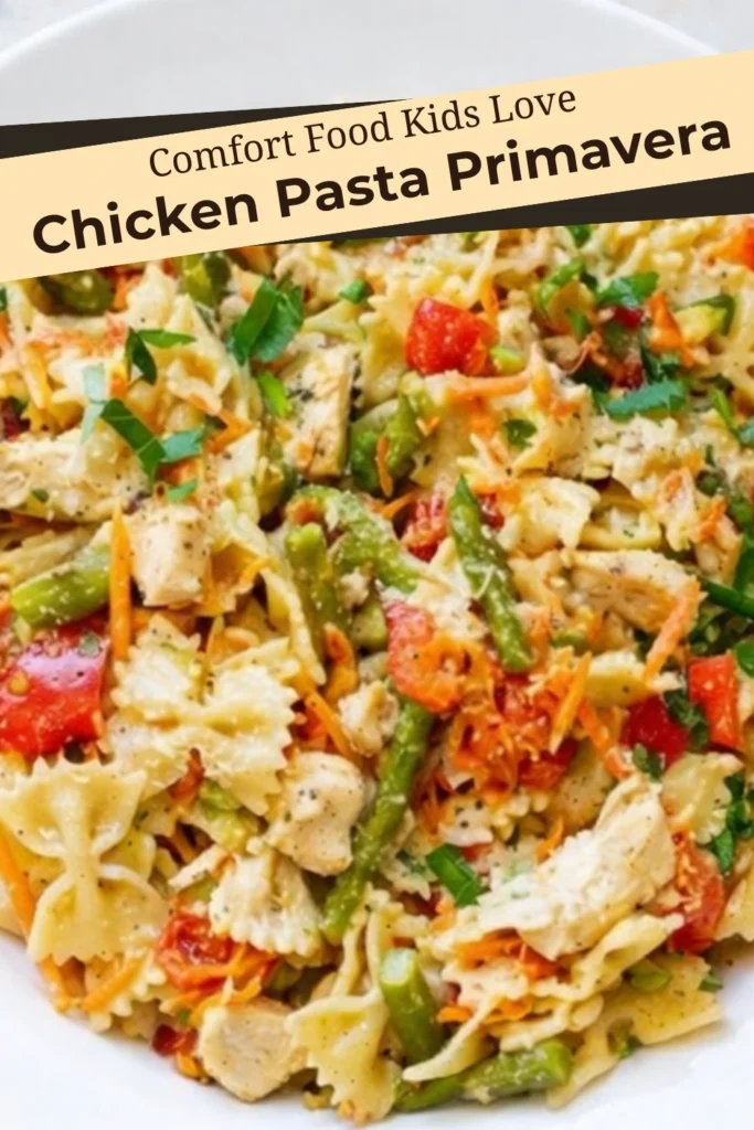 Chicken pasta primavera comfort food with vegetables and creamy sauce