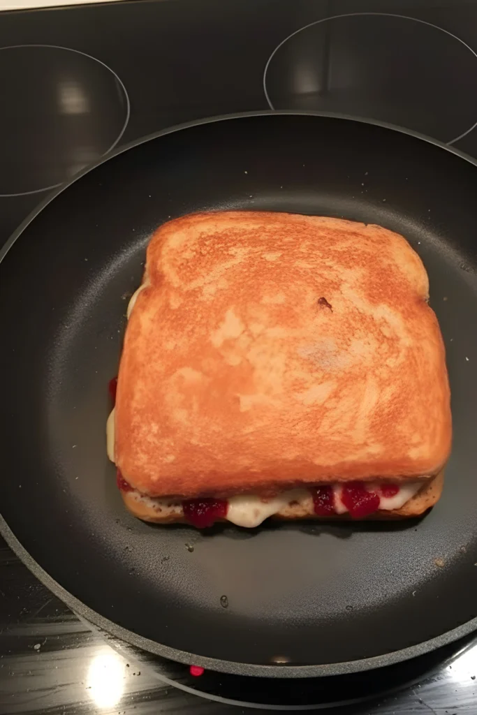 Grilling Apple Cranberry Grilled Cheese Sandwich to Perfect Crisp