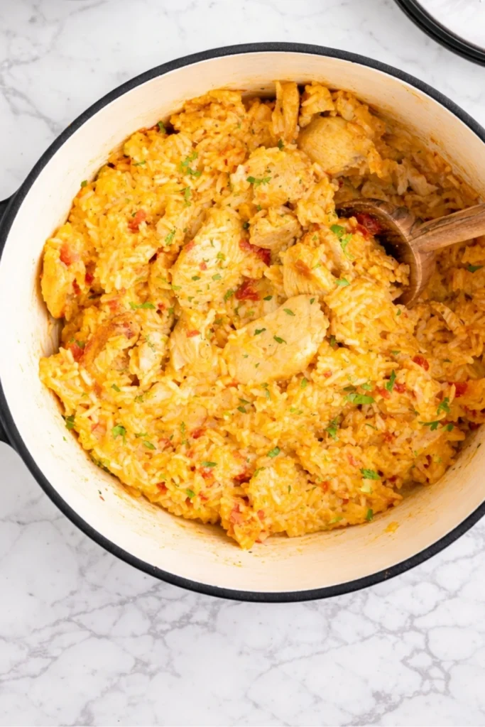 One Pot Queso Chicken and Rice in Dutch Oven with Tender Chicken