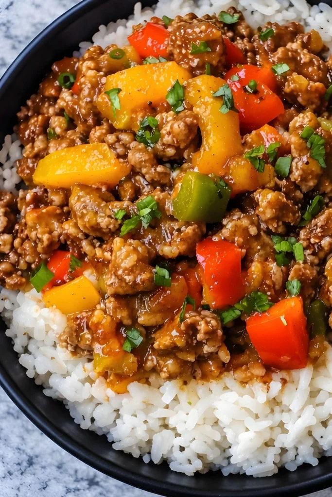 Beef and pepper rice bowl with ground beef bell peppers and white rice
