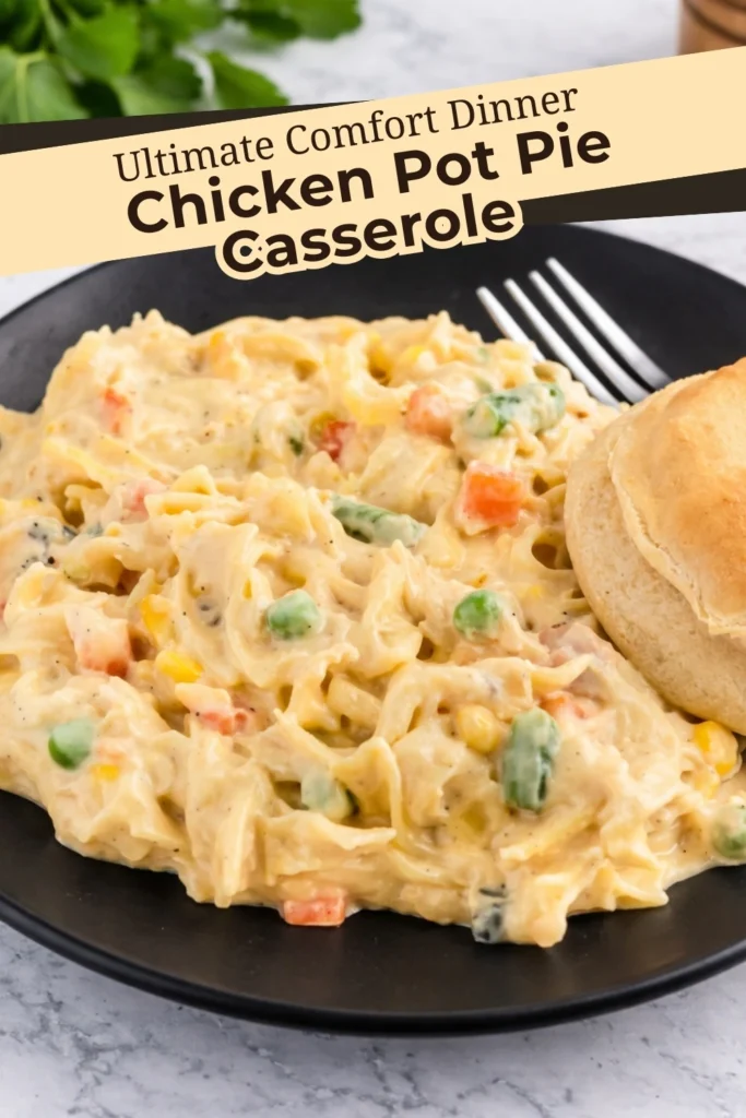 Chicken pot pie casserole with creamy noodles vegetables and biscuit