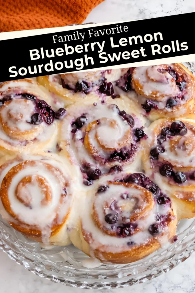 Blueberry lemon sourdough sweet rolls with lemon glaze in a glass dish, labeled “Family Favorite” in bold overlay text