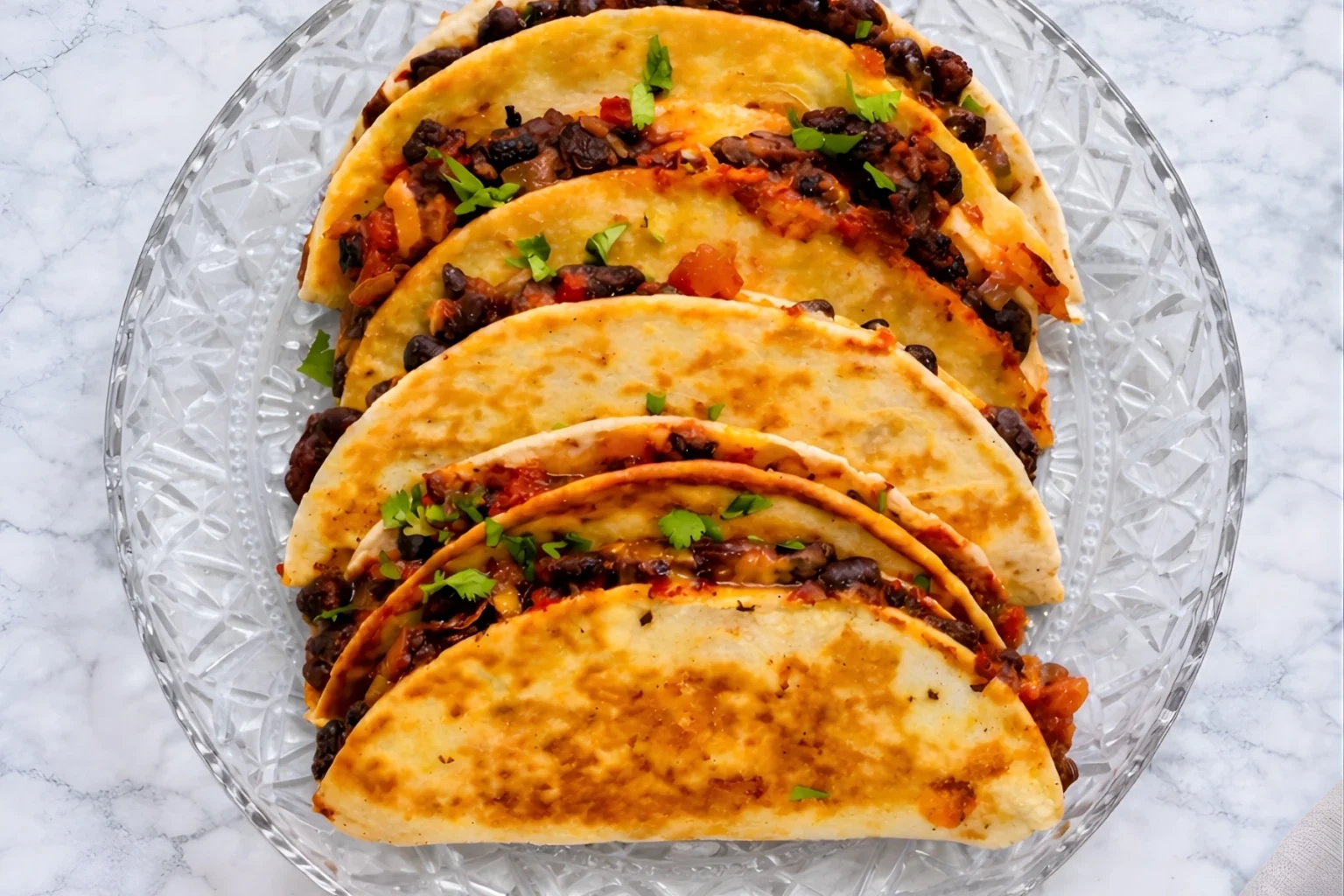 Crispy Black Bean Tacos with Fresh Cilantro and Cheesy Filling