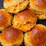 Spicy Buffalo Chicken Sliders with Cheesy Filling and Toasted Buns