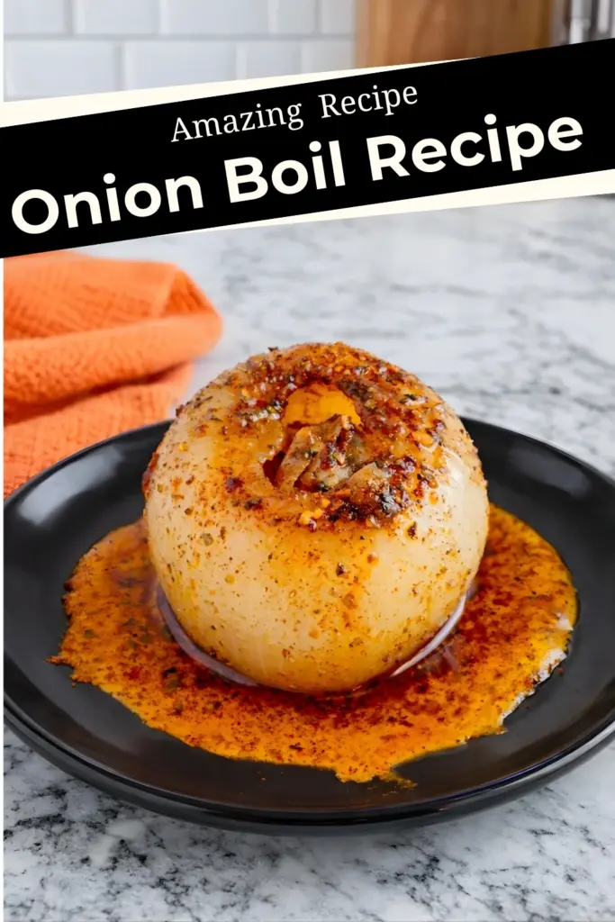 Amazing onion boil recipe Pinterest pin with roasted onion in cajun butter sauce