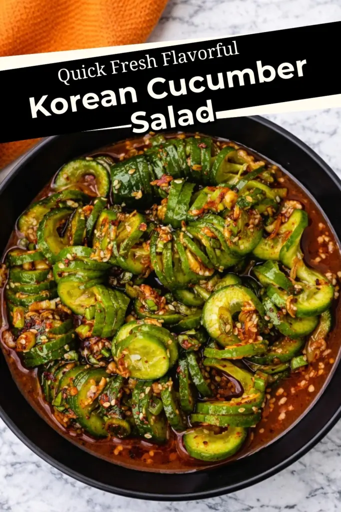 Korean cucumber salad with spicy garlic sesame dressing in black bowl