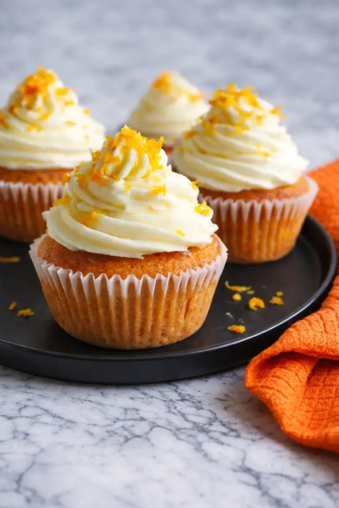 Orange Blossom Cupcakes with Cream Cheese Frosting and Orange Zest