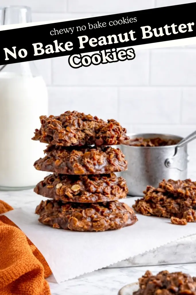 no bake peanut butter cookies stacked with chocolate oats on parchment paper marble kitchen background