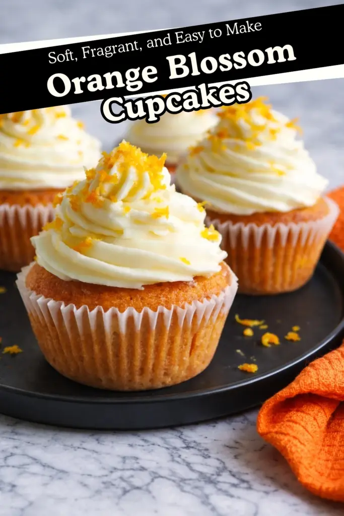 Orange Blossom Cupcakes with Frosting and Text Overlay Recipe Title