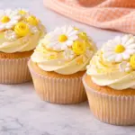 Daisy Cupcakes with Vanilla Frosting and Floral Toppers