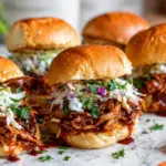BBQ Chicken Sliders with Coleslaw on Marble Countertop